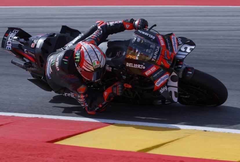 Team Aprilia Racing's Marco Bezzecchi takes a curve during the first free practice at the Motorland circuit in Alcaniz, northeastern Spain, on the eve of the Moto GP Aragon Grand Prix, on August 28, 2026.  Pierre-Philippe MARCOU / AFP