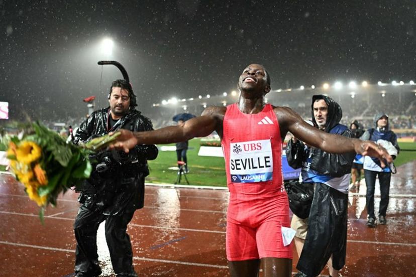 Jamaica's Oblique Seville celebrates after winning  the men's 100m event of the IAAF Diamond League athletics meeting "Athletissima" at Stade Olympique de la Pontaise in Lausanne, on August 20, 2025.  Fabrice COFFRINI / AFP