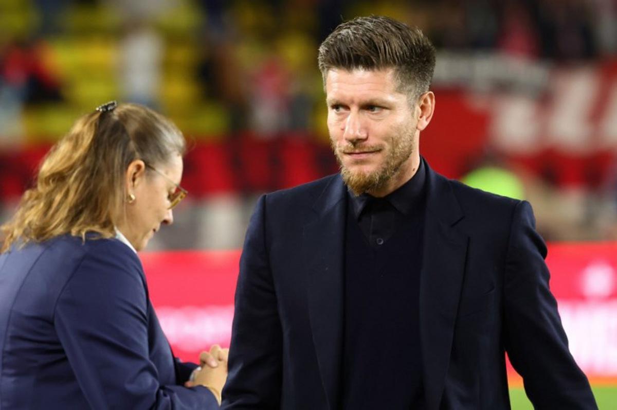 Monaco's Belgian head coach Sebastien Pocognoli looks on before the French L1 football match between AS Monaco and RC Lens at the Stade Louis II in the Principality of Monaco on November 8, 2025.  Clement MAHOUDEAU / AFP