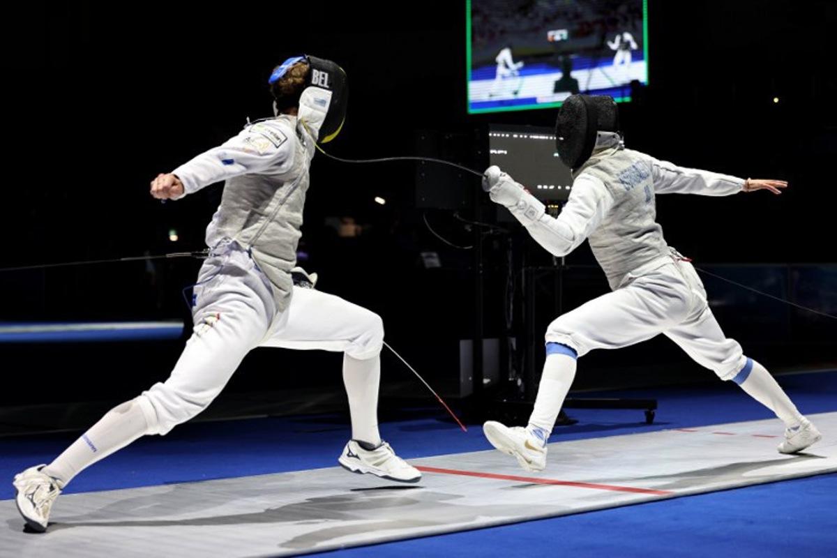 Individual Neutral Athlete Kirill Borodachev (R) and Belgium's Stef Van Campenhout compete in their men's foil individual bout during the FIE Fencing World Championships in Tbilisi on July 23, 2025.  Giorgi ARJEVANIDZE / AFP