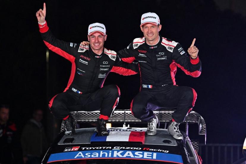 Sebastien Ogier (R) and his co-driver Vincent Landais (L) of France celebrate their victory on their Toyota GR Yaris Rally1 during the podium ceremony of the Rally Japan, the 13th round of the FIA World Rally Championships, in Toyota city, Aichi prefecture on November 9, 2025.  Toshifumi KITAMURA / AFP