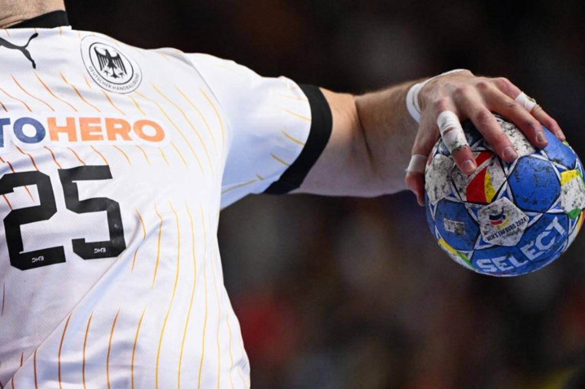 Germany's right back #25 Kai Haefner vies during the Men's EURO 2024 EHF Handball European Championship match for third place between Sweden and Germany in Cologne, western Germany on January 28, 2024.  Kirill KUDRYAVTSEV / AFP