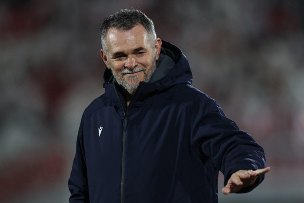 Georgia's coach Willy Sagnol is seen prior to the friendly football match between Georgia and Israel in Tbilisi on March 26, 2026.  Giorgi ARJEVANIDZE / AFP