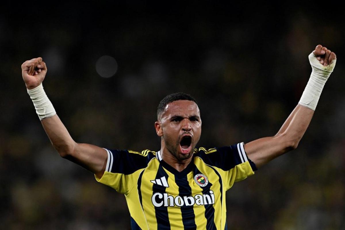 Fenerbahce's Moroccan forward #19 Youssef En-Nesyri celebrates after scoring his team's fourth goal during the UEFA Champions League 3rd round second leg football match between Fenerbahce (TUR) and Feyenoord (NED) at the Fenerbahçe Sükrü Saracoglu Sport Complex in Istanbul on August 12, 2025.  Ozan KOSE / AFP
