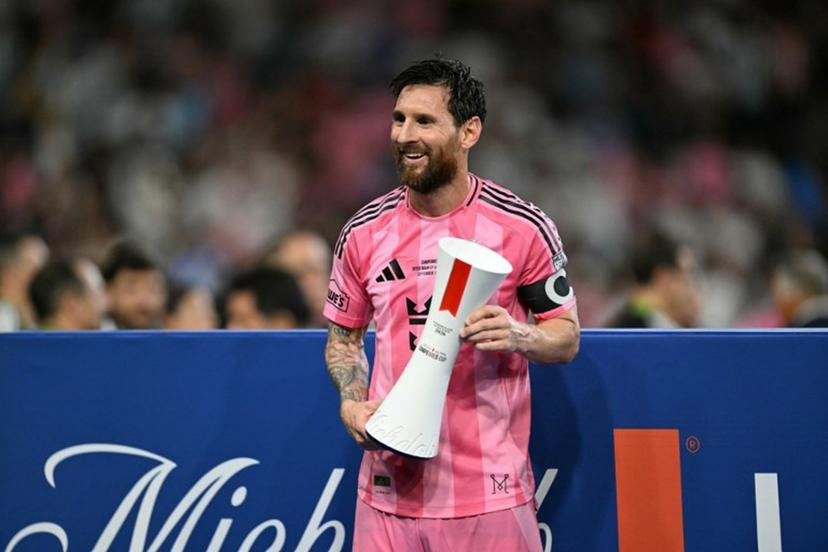 Inter Miami's Argentine forward #10 Lionel Messi holds the Superior Player of the Match trophy after his team defeated Mexico's Cruz Azul in the Campeones Cup final at Nu Stadium in Miami, Florida, on September 16, 2026.  CHANDAN KHANNA / AFP