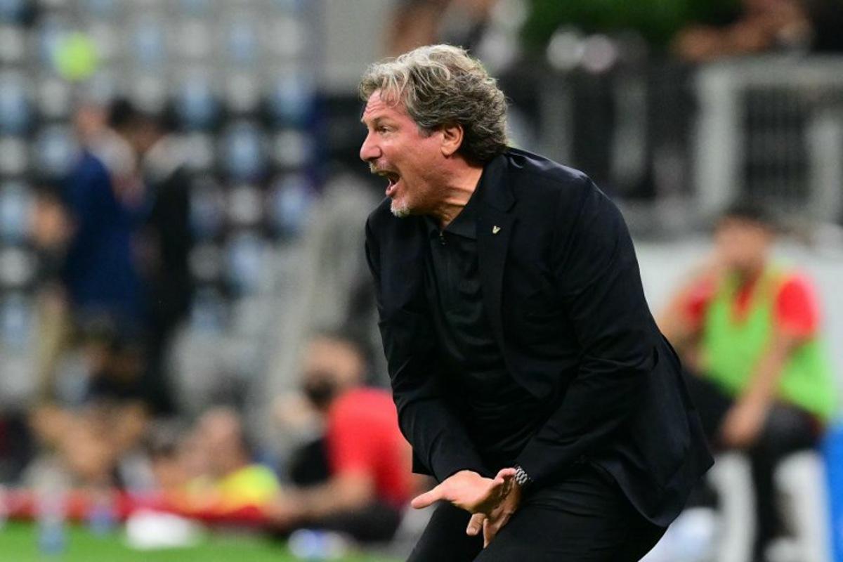 Venezia FC's Italian coach Giovanni Stroppa reacts during the Italian Serie A football match between AC Milan and Venezia FC at San Siro stadium in Milan, northern Italy, on August 28, 2026.  Stefano RELLANDINI / AFP