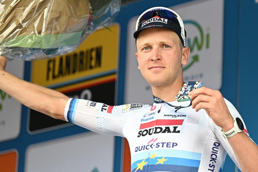 Belgian Tim Merlier of Soudal Quick-Step celebrates on the podium after winning the fourth stage of the 'Renewi Tour' multi-stage cycling race, from Riemst to Bilzen-Hoeselt (196 km) on Saturday 23 August 2025. The five-day race takes place in Belgium and the Netherlands.  BELGA PHOTO DAVID PINTENS