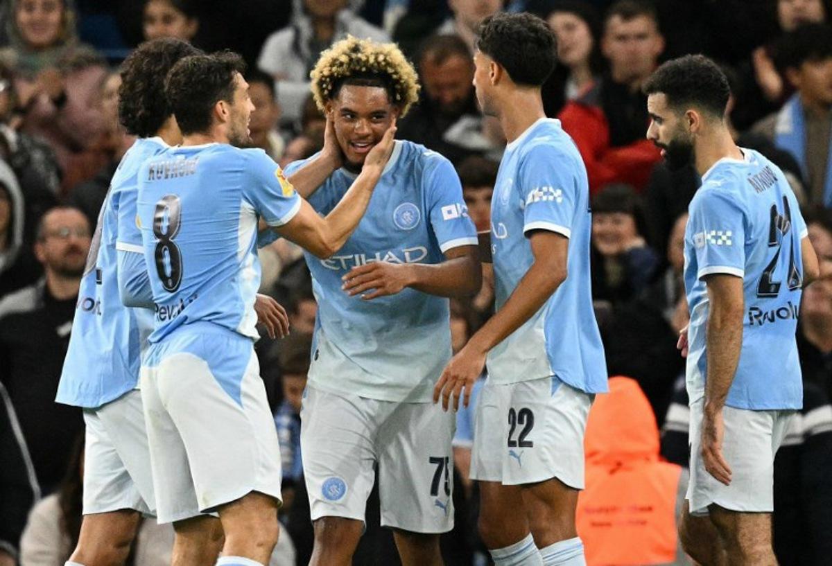Manchester City's French midfielder #75 Floyd Samba (C) celebrates scoring the opening goal during the English League Cup third round football match between Manchester City and Norwich City at the Etihad stadium in Manchester, northwest England on September 17, 2026.  Oli SCARFF / AFP