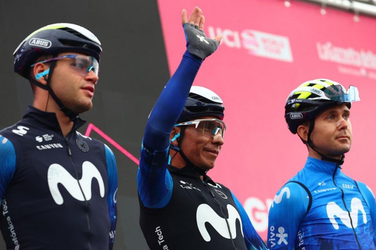Team Movistar's Colombian rider Nairo Quintana (C) waves flanked by his teammates before the start of the 20th stage of the 107th Giro d'Italia cycling race, 184km between Alpago and Bassano del Grappa on May 25, 2024.  Luca Bettini / AFP