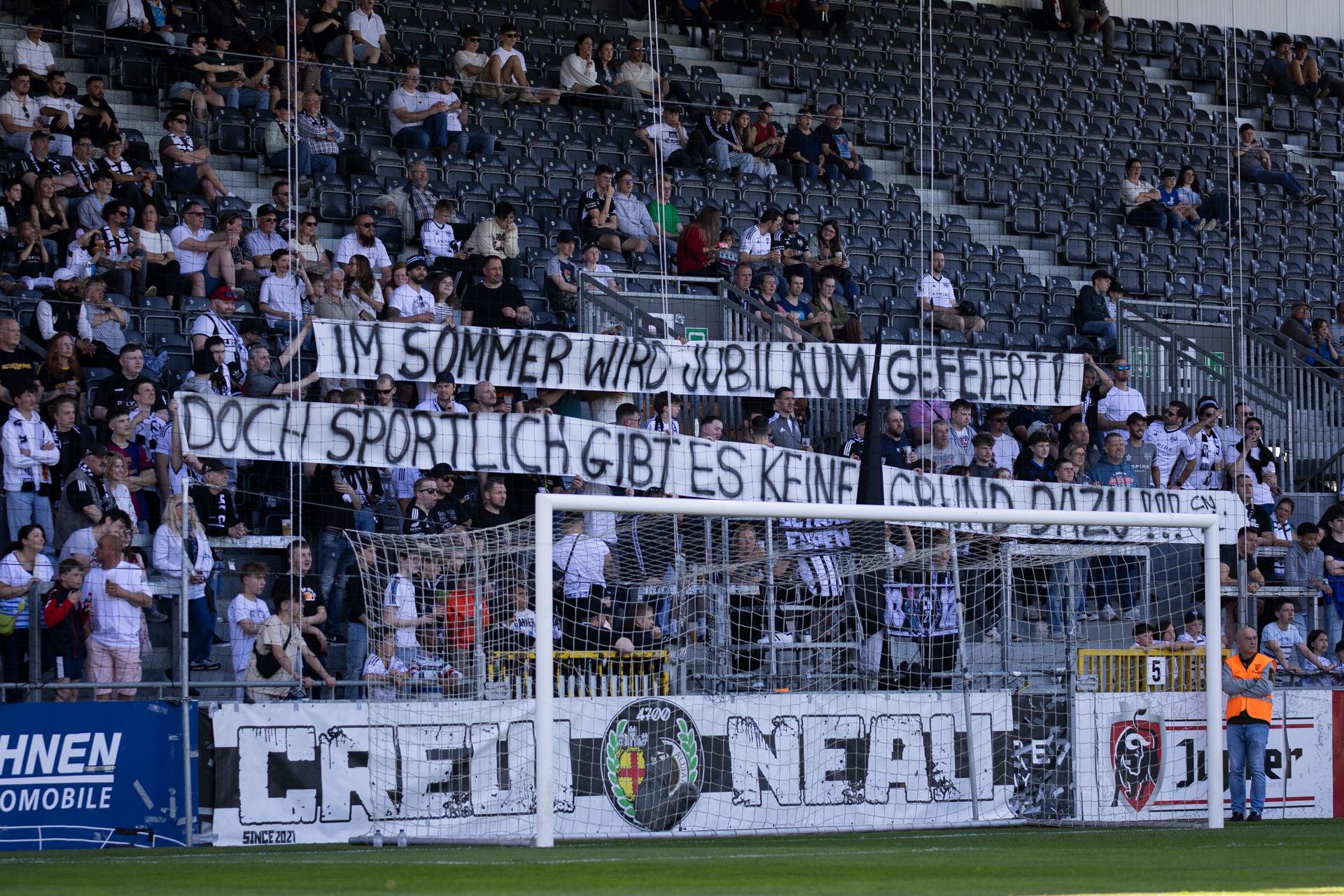 Kas Eupen fans pictured during a soccer match between KAS Eupen and RFC Seraing, in Eupen, on day 29 of the 2024-2025 'Challenger Pro League' 1B second division of the Belgian championship, Saturday 12 April 2025. BELGA PHOTO NATACHA FREISEN
