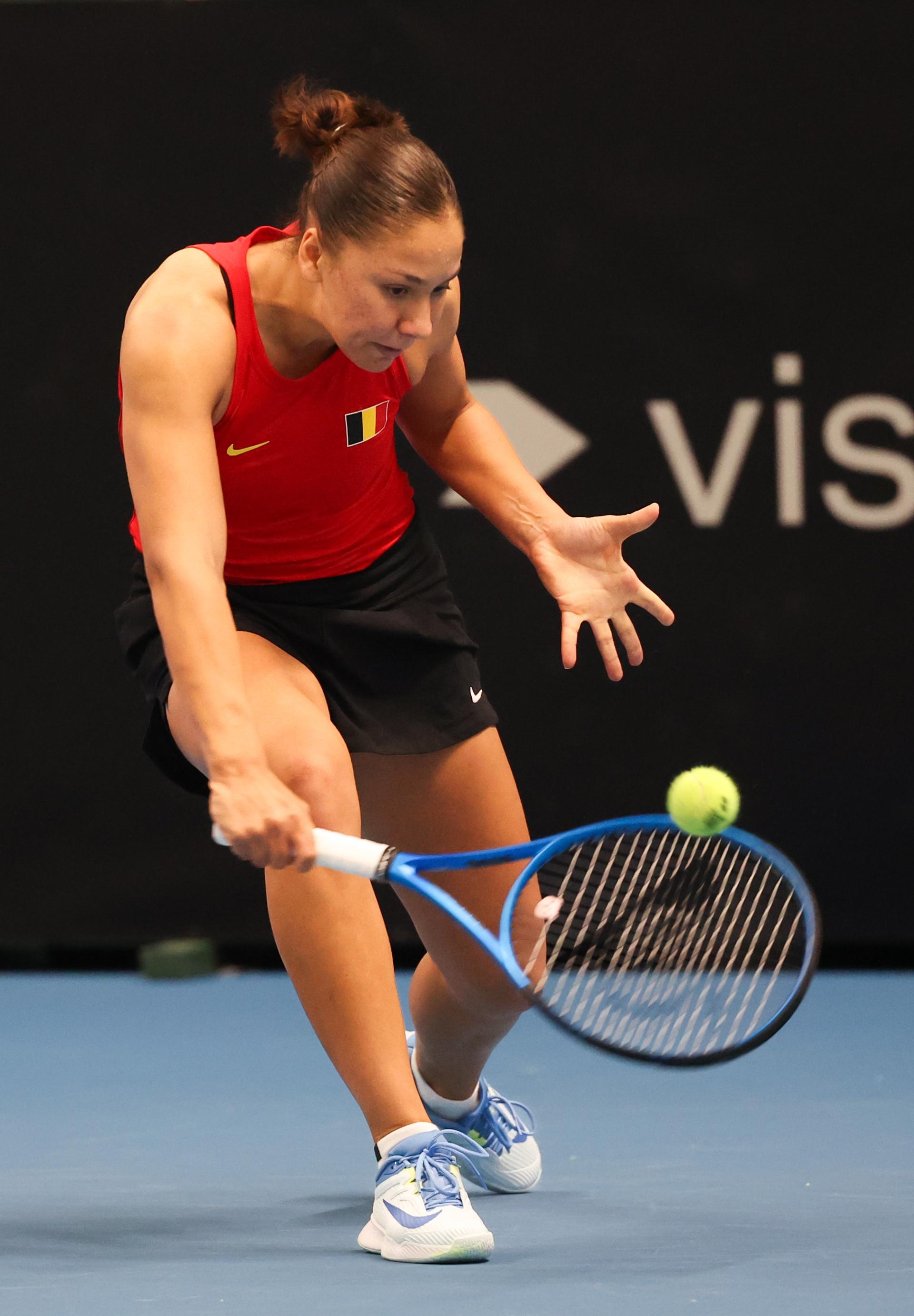 Belgian Sofia Costoulas pictured in action during a tennis match between Belgian Costoulas and Hungarian Toth, in the meeting between Belgium and Hungary in the pool phase of the Europe/Africa Group I of the Billie Jean King Cup tennis, in Vilnius, Lithuania on Wednesday 09 April 2025. PHOTO VIRGINIE LEFOUR PHOTO VIRGINIE LEFOUR