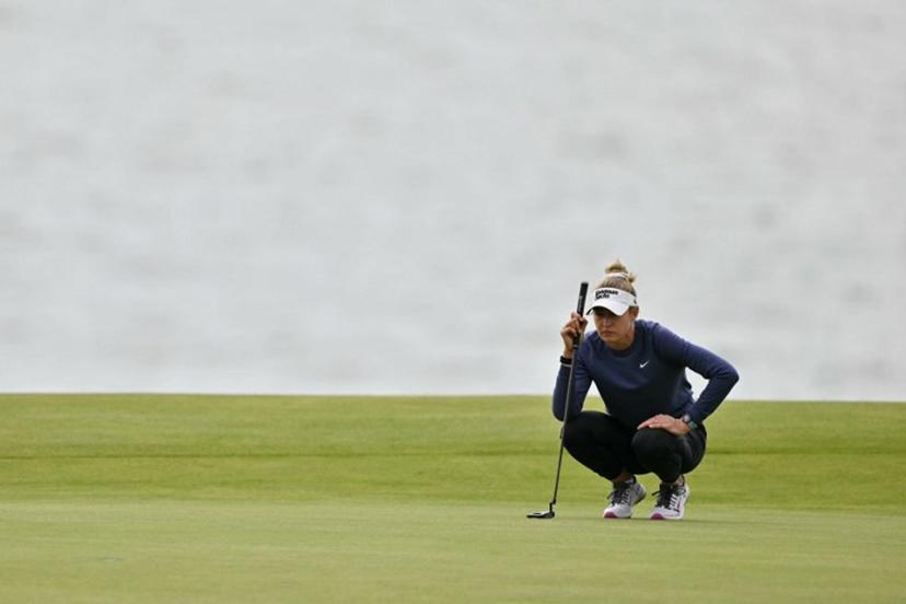 US player Nelly Korda lines up her put on the second green on day three of the Women's British Open Golf Championship, at Royal Porthcawl in south Wales on August 2, 2025.  Glyn KIRK / AFP