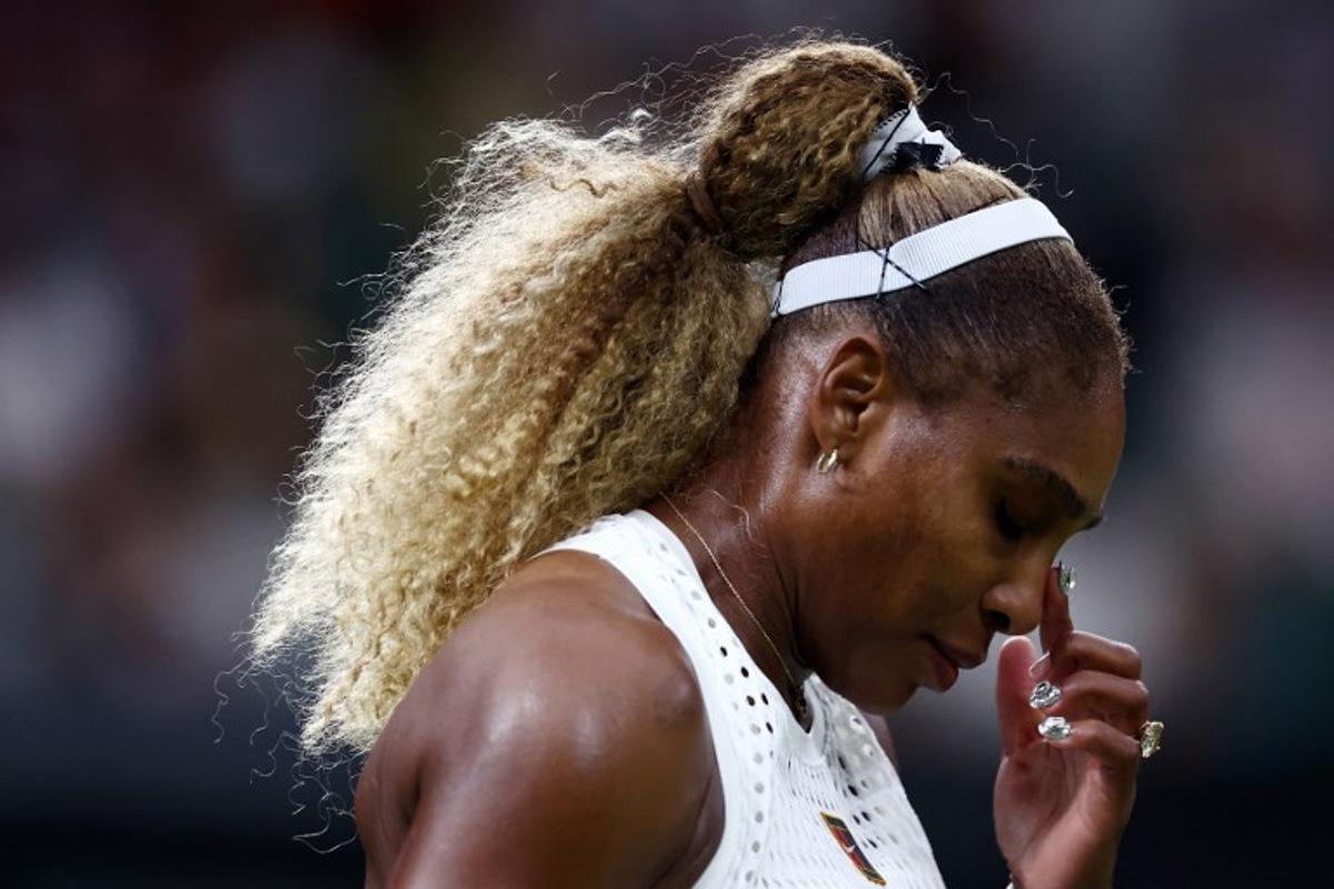 US player Serena Williams reacts as she plays against Australia's Maya Joint during their women's singles first round tennis match on the second day of the 2026 Wimbledon Championships at The All England Lawn Tennis and Croquet Club in Wimbledon, southwest London, on June 30, 2026.  HENRY NICHOLLS / AFP
