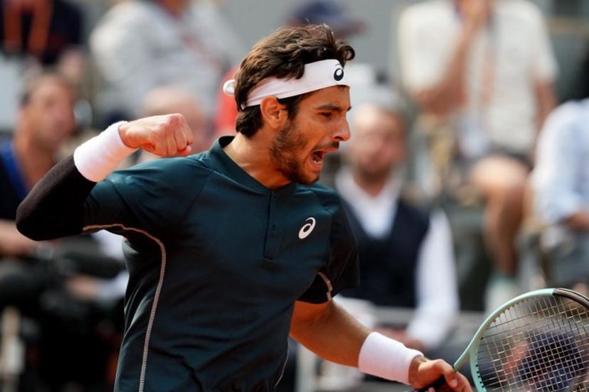 Italy's Lorenzo Musetti reacts after a point during his men's singles quarter-final match against US Frances Tiafoe on day 10 of the French Open tennis tournament on Court Philippe-Chatrier at the Roland-Garros Complex in Paris on June 3, 2025.  Dimitar DILKOFF / AFP