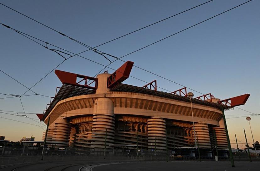 This picture shows the San Siro stadium at the sunset, in Milan, on September 29,2025.  The city of Milan approved on September 30, 2025 the sale of the San Siro stadium to the city's two football giants Inter Milan and AC Milan. Stefano RELLANDINI / AFP