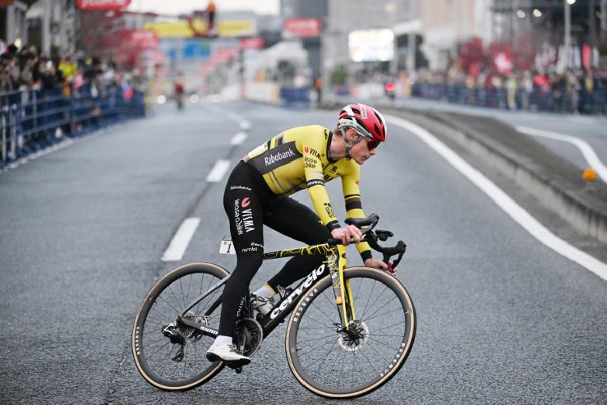 Team Visma-Lease a Bike rider Jonas Vingegaard of Denmark takes a corner on the way to winning the Tour de France Saitama Criterium cycling race in Saitama on November 9, 2025.  GREG BAKER / AFP