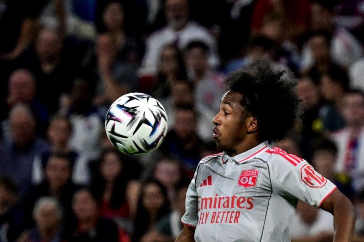 Lyon's Belgian forward #11 Malick Fofana controls the ball during the French L1 football match between Olympique Lyonnais (OL) and SCO Angers at the Groupama Stadium in Decines-Charpieu, near Lyon, central-eastern France on September 19, 2025.  OLIVIER CHASSIGNOLE / AFP