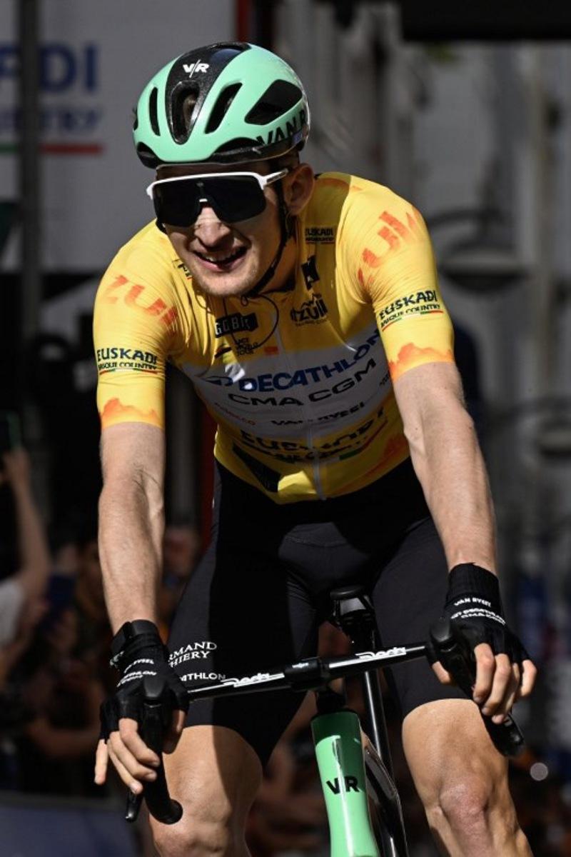 Team Decathlon CMA CGM's French rider Paul Seixas crosses the finish line to win the fifth stage of the Basque Country's Itzulia cycling tour, a 176.2 km race starting and finishing in Eibar, on April 10, 2026.   ANDER GILLENEA / AFP