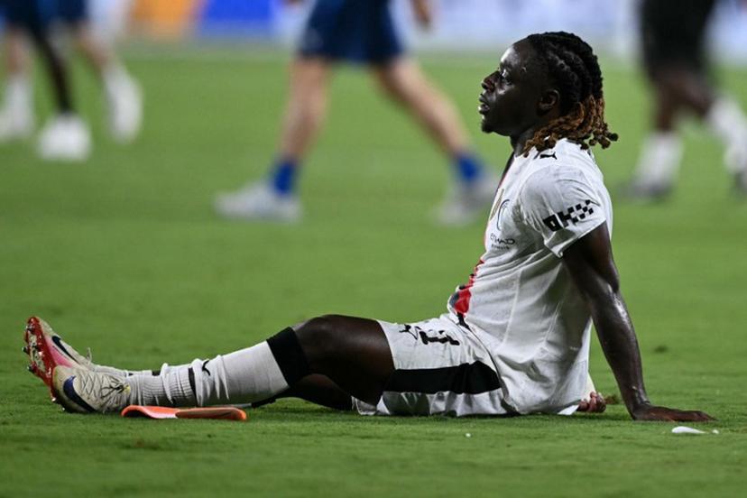 Manchester City's Belgian midfielder #11 Jeremy Doku reacts after losing the FIFA Club World Cup 2025 round of 16 football match between England's Manchester City and Saudi's Al-Hilal at the Camping World stadium in Orlando on June 30, 2025.  PATRICIA DE MELO MOREIRA / AFP