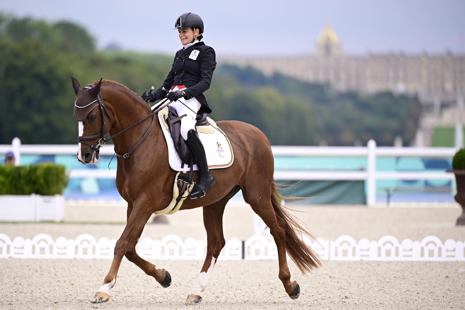 Belgian Barbara Minneci and her horse Stuart pictured in action during the Individual Freestyle Event Grade III equestrian event, on day 11 of the 2024 Summer Paralympic Games in Paris, France on Saturday 07 September 2024. The 17th Paralympics are taking place from 28 August to 8 September 2024 in Paris. BELGA PHOTO LAURIE DIEFFEMBACQ