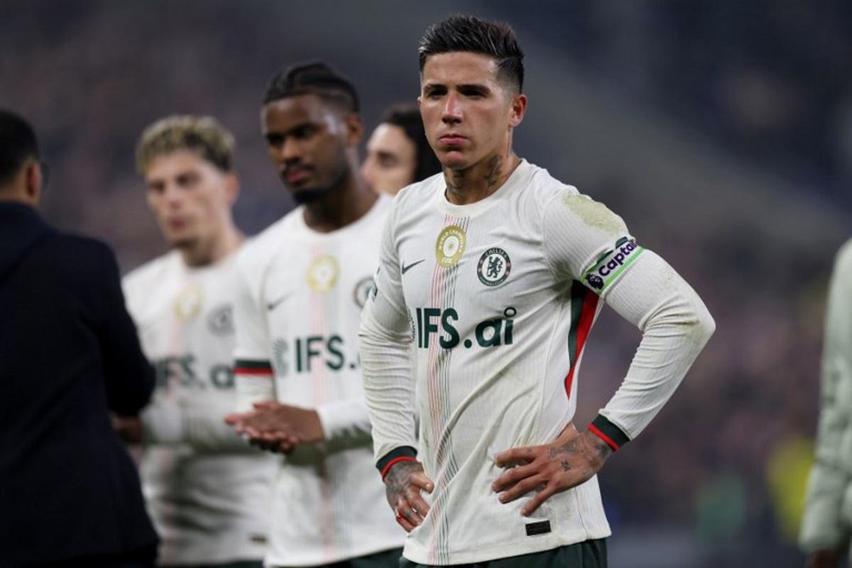 Chelsea's Argentinian midfielder #08 Enzo Fernandez looks on following the English Premier League football match between Everton and Chelsea at the Hill Dickinson Stadium in Liverpool, north west England on March 21, 2026.  Darren Staples / AFP