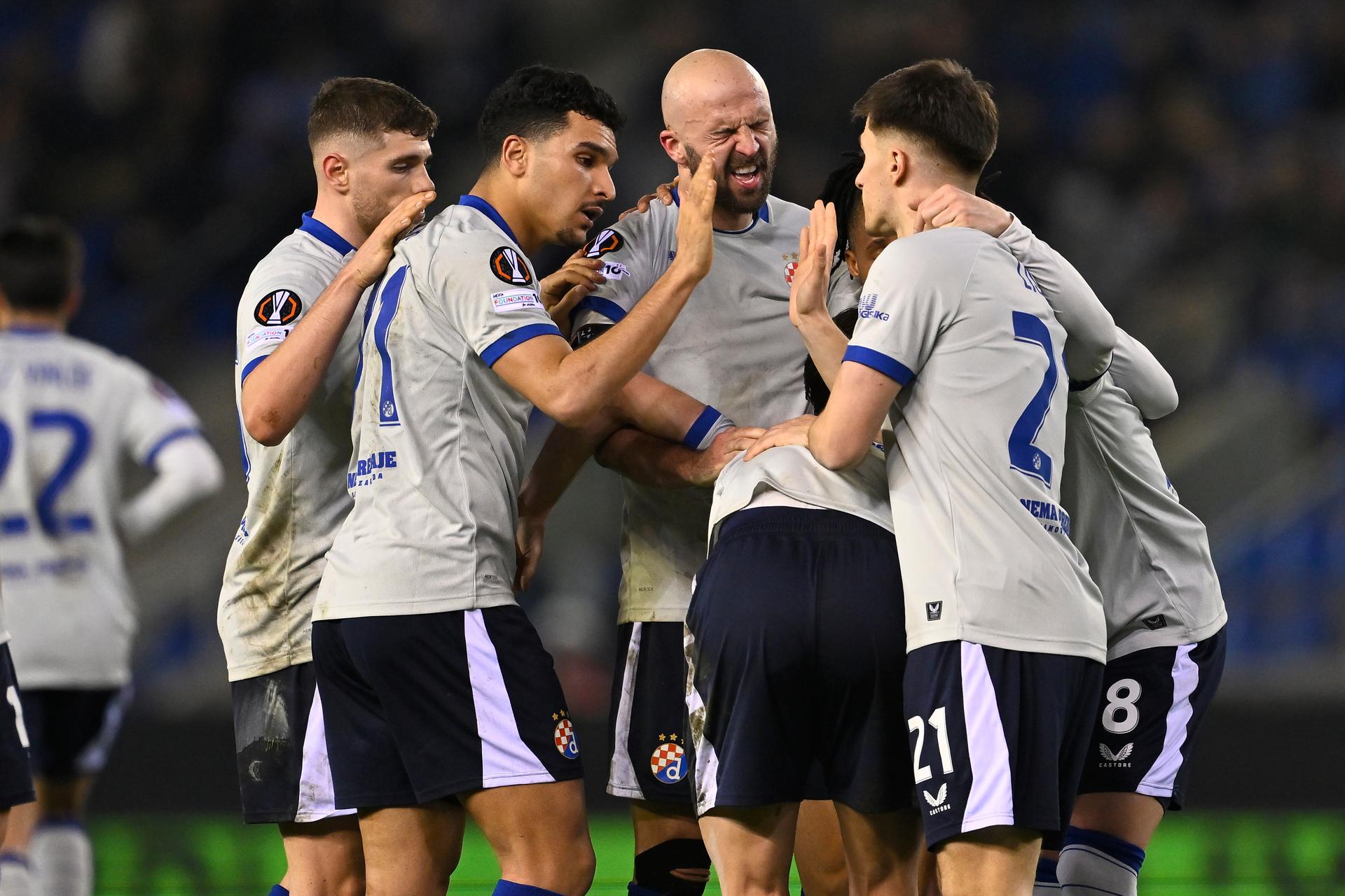 Dinamo's players celebrate after scoring during a soccer game between Belgian team KRC Genk and Croatian GNK Dinamo Zagreb, Thursday 26 February 2026 in Genk, in the play-off for the knockout phase of the UEFA Europa League tournament. Genk won the first leg 1-3. BELGA PHOTO JOHAN EYCKENS