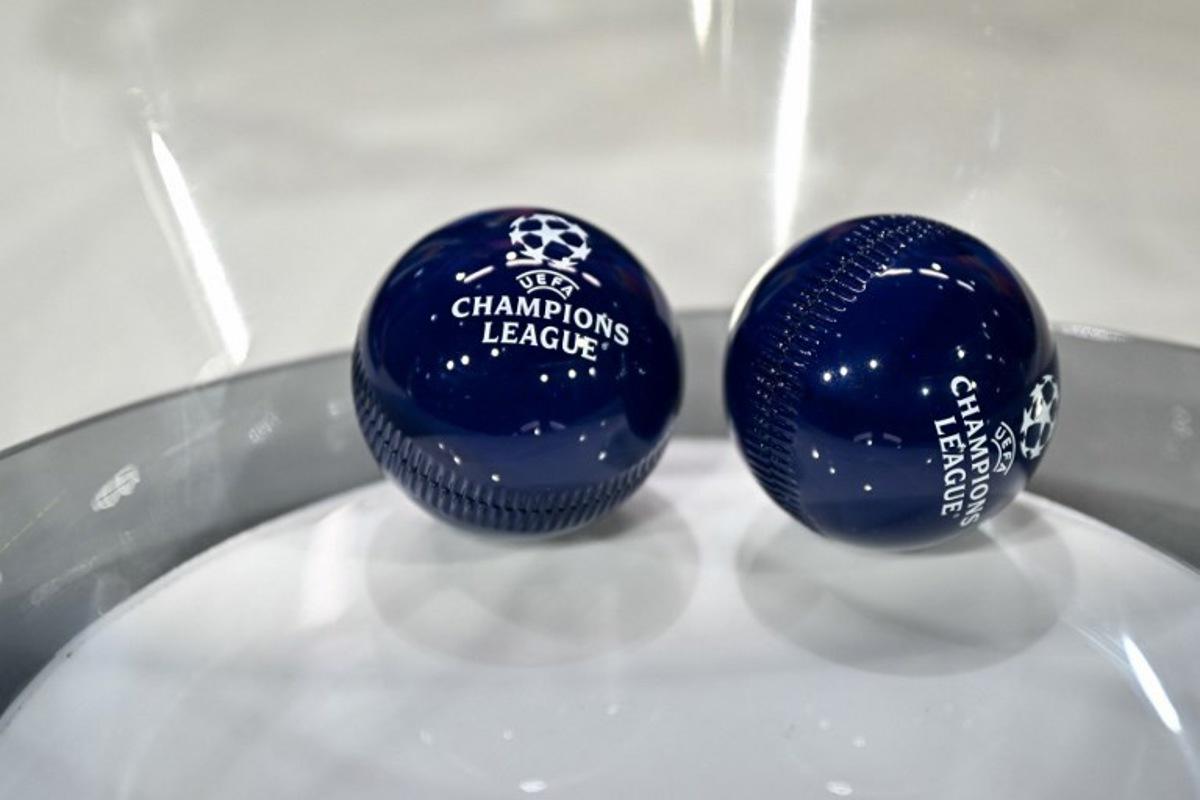 This photograph shows the draw balls bearing the competition logo ahead of the 2025-2026 UEFA Champions League round of 16, quarter-final and semi-final draw at the House of European Football in Nyon, western Switzerland on February 27, 2026.  Harold CUNNINGHAM / AFP
