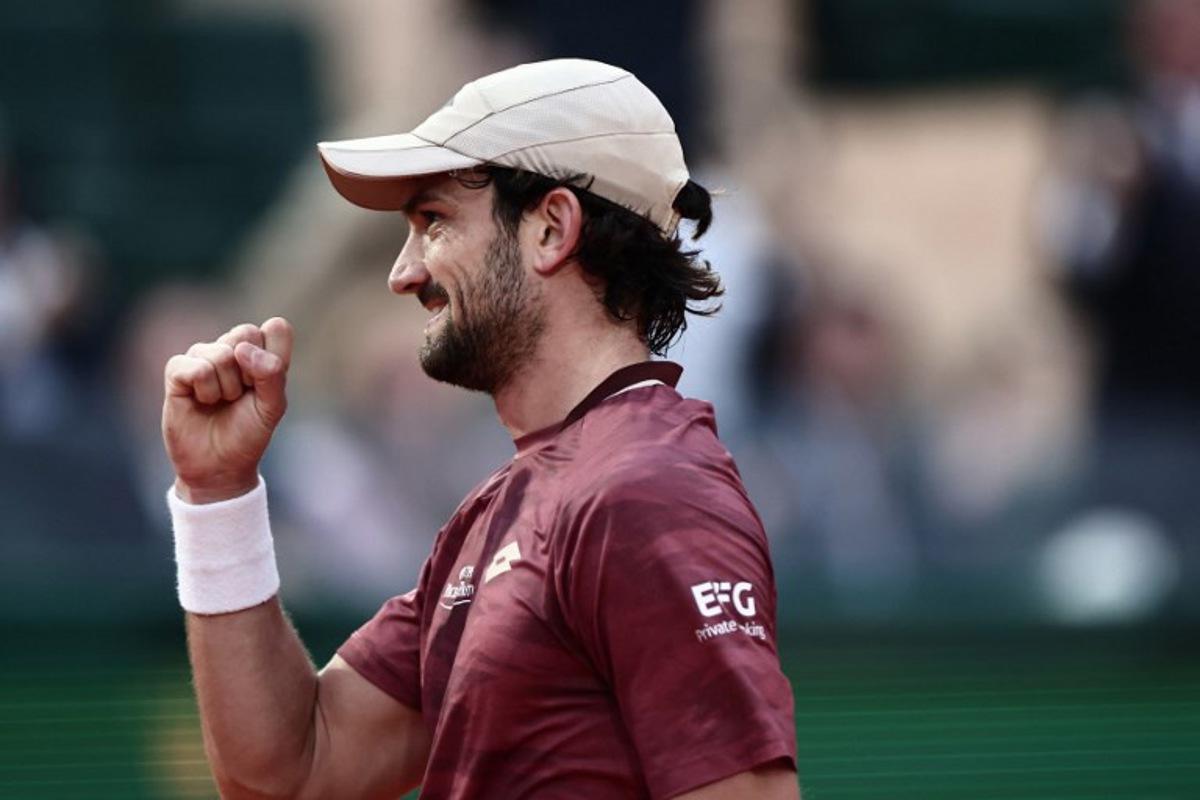 Monaco's Valentin Vacherot reacts as he plays against Australia's Alex De Minaur during the Monte Carlo ATP Masters Series Tournament quarter final tennis match on Court Rainier III at the Monte-Carlo Country Club in Roquebrune-Cap-Martin, south-eastern France on April 10, 2026.  Thibaud MORITZ / AFP