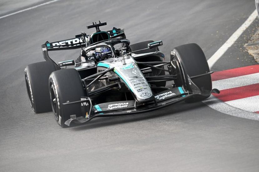 Mercedes' British driver George Russell drives during a practice session ahead of the Formula One Singapore Grand Prix at the Marina Bay Street Circuit in Singapore on October 9, 2026.  Lillian SUWANRUMPHA / AFP