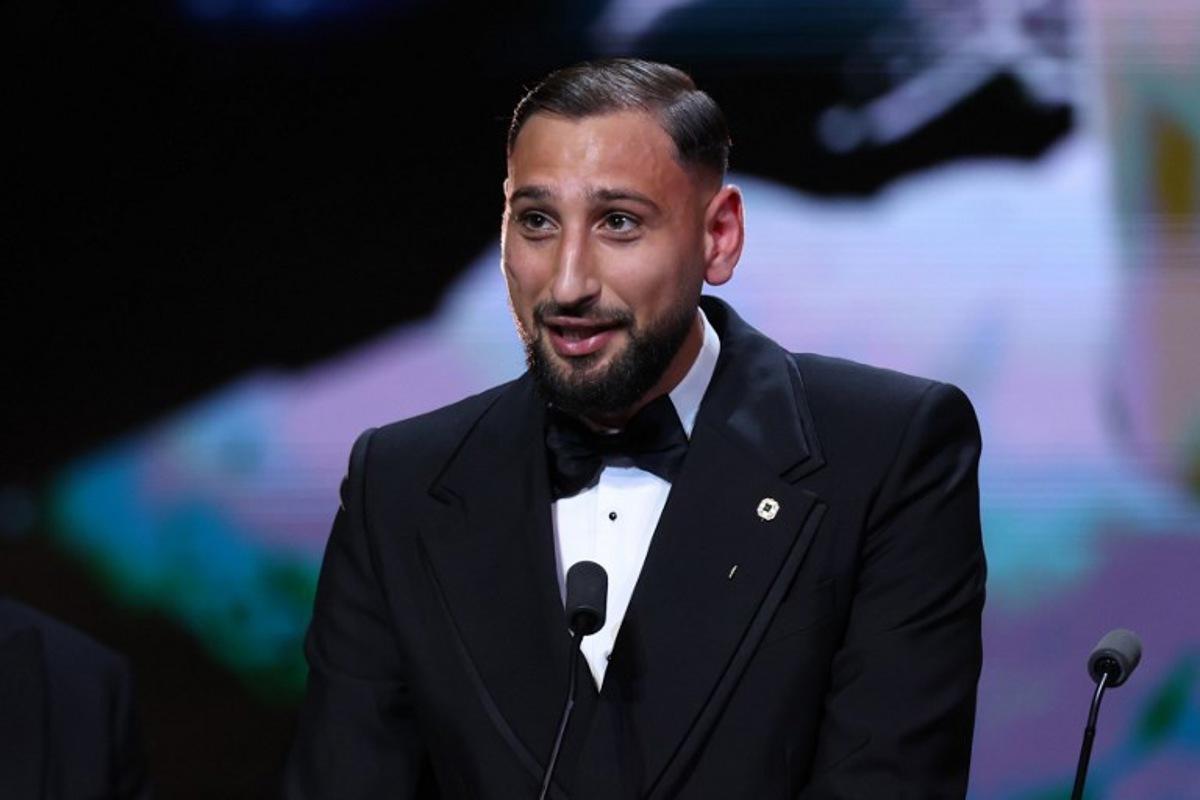 Italy's goalkeeper Gianluigi Donnarumma speaks after receiving the Yashin Trophy for the best male goalkeeper during the 2025 Ballon d'Or France Football award ceremony at the Theatre du Chatelet in Paris on September 22, 2025.  Franck FIFE / AFP