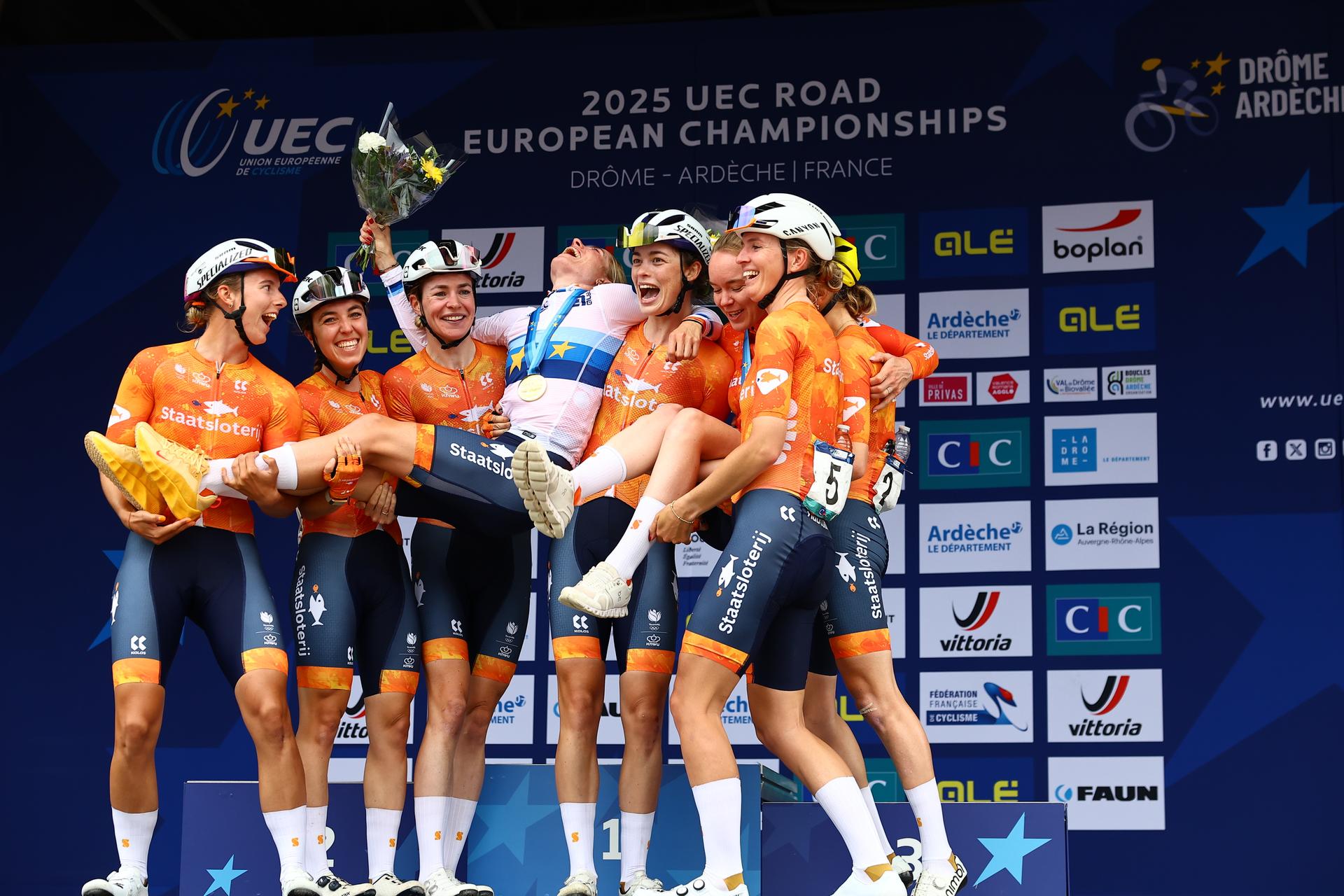 Winner Netherlands Demi Vollering pose with team-mates on the podium after winning the Women Elite road race of 116,1 km at the UEC road European cycling championships, Saturday 04 October 2025, in Loriol-sur-Drome, France. The European cycling championships Drome-Ardeche takes place from 1 to 5 October. BELGA PHOTO DAVID PINTENS