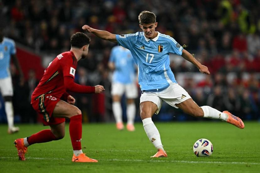 Belgium's striker #17 Charles De Ketelaere shoots during the 2026 World Cup Group J qualifier football match between Wales and Belgium, at Cardiff City Stadium, in Cardiff, on October 13, 2025.   Paul ELLIS / AFP