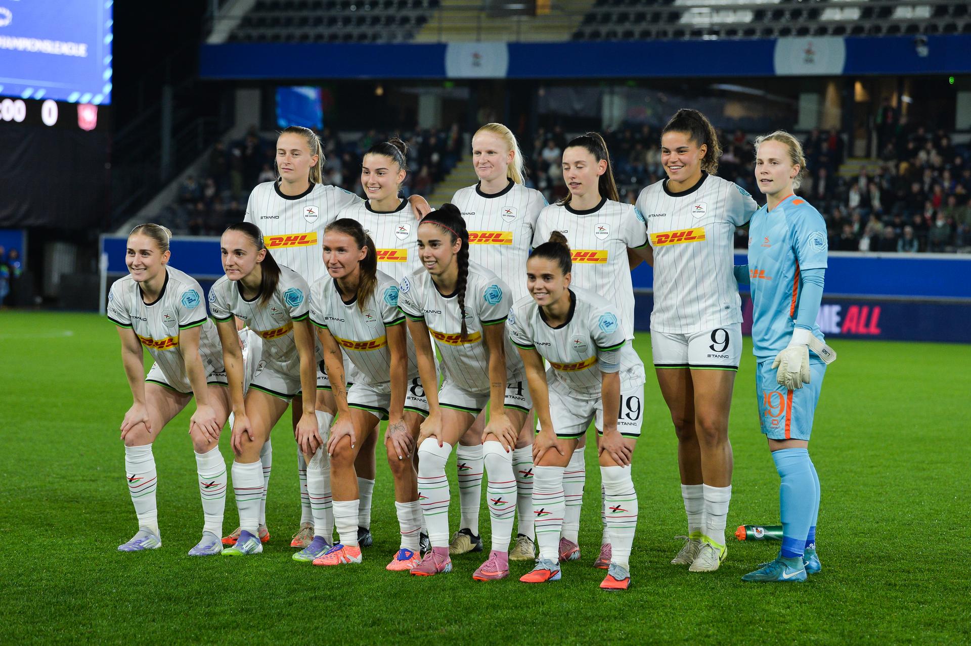 OHL Women's goalkeeper Lowiese Seynhaeve, OHL Women's Kim Everaerts, OHL Women's Virag Nagy, OHL Women's Zenia Mertens, OHL Women's Sara Pusztai, OHL Women's Jada Conijnenberg, OHL Women's Aurelie Reynders, OHL Women's Ionna Papatheodorou, OHL Women's Jeslynn Kuijpers, OHL Women's Linde Veefkind and OHL Women's Julie Biesmans pictured before a soccer match between Oud-Heverlee Leuven Women and Dutch FC Twente Vrouwen, Wednesday 15 October 2025 in Leuven, the second game in the league phase of the UEFA Women's Champions League competition. BELGA PHOTO JILL DELSAUX