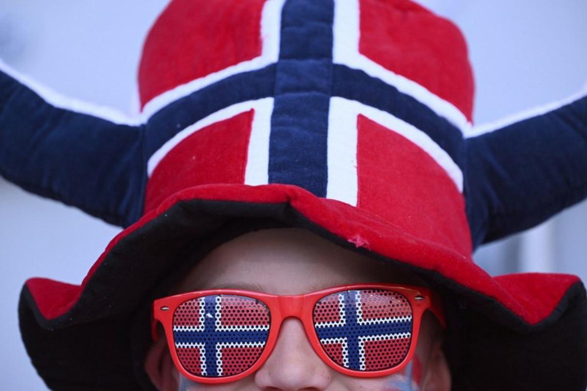 A Norway fan waits for the start of the UEFA Women's Euro 2025 Group A football match between Norway and Iceland at the Arena Thun stadium in Thun on July 10, 2025.  SEBASTIEN BOZON / AFP