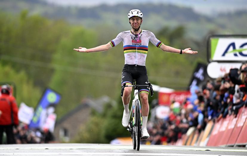 Slovenian Tadej Pogacar of UAE Team Emirates celebrates after winning the men's race of the 'La Fleche Wallonne', one day cycling race (Waalse Pijl - Walloon Arrow), 205,2 km from Ciney to Huy, Wednesday 23 April 2025. BELGA PHOTO JASPER JACOBS