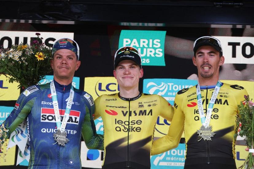 Team Visma Lease a Bike's Norwegian rider Per Strand Gagenes (C) celebrates on the podium flanked by second-placed Soudal Quick-Step's Belgian rider Jasper Stuyven (L) and third-placed Team Visma Lease a Bike's  Christophe Laporte (R), after winning the 120th edition of Paris-Tours, a 216-km cycling race from Chartres to Tours, in Tours, France, on October 11, 2026.  Alain JOCARD / AFP