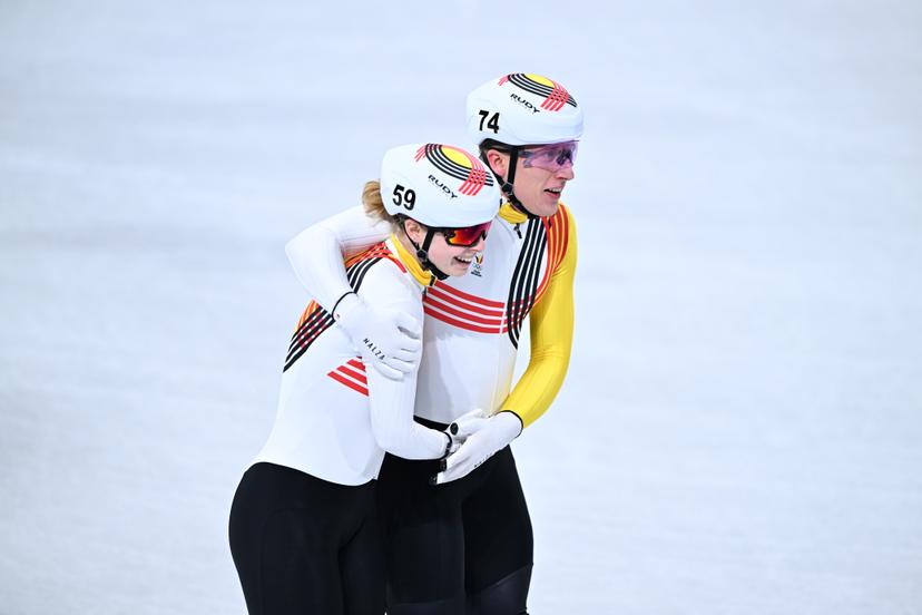 Belgian shorttrack skater Tineke den Dulk and Belgian shorttrack skater Ward Petre celebrate after the semifinals of the Mixed Team Relay of the Short Track Speed Skating competition at the Milano Cortina 2026 Olympic Winter Games, on Tuesday 10 February 2026 in Milan, Italy. The XXV Winter Olympics take place from 6 to 22 February 2026 in Italy. BELGA PHOTO JASPER JACOBS