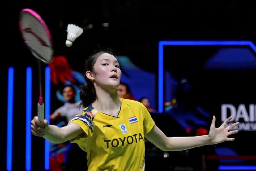 Thailand's Pitchamon Opatniputh hits a return during her women's singles final match against China's Chen Yufei at the Indonesia Masters badminton tournament in Jakarta on January 25, 2026.  BAY ISMOYO / AFP