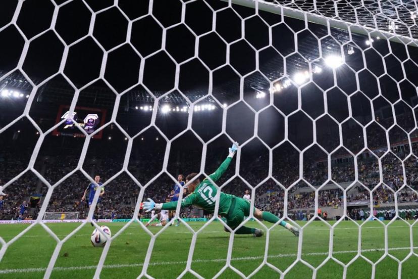 Ukraine's goalkeeper #12 Anatoliy Trubin concedes second goal 0:2 during the 2026 World Cup qualifiers Europe zone group D football match between Ukraine and France, on September 5, 2025 in Wroclaw, Poland.  Franck FIFE / AFP