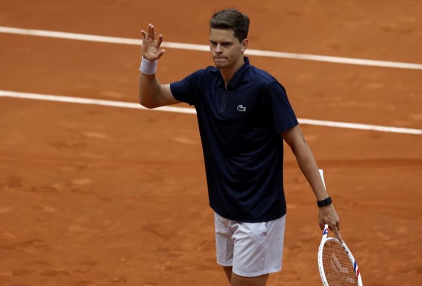 Belgium's Alexander Blockx celebrates after winning the 2026 ATP Tour Madrid Open tennis tournament third round singles tennis match against Canada's Felix Auger-Aliassime at the Caja Magica in Madrid, on April 27, 2026.  OSCAR DEL POZO / AFP