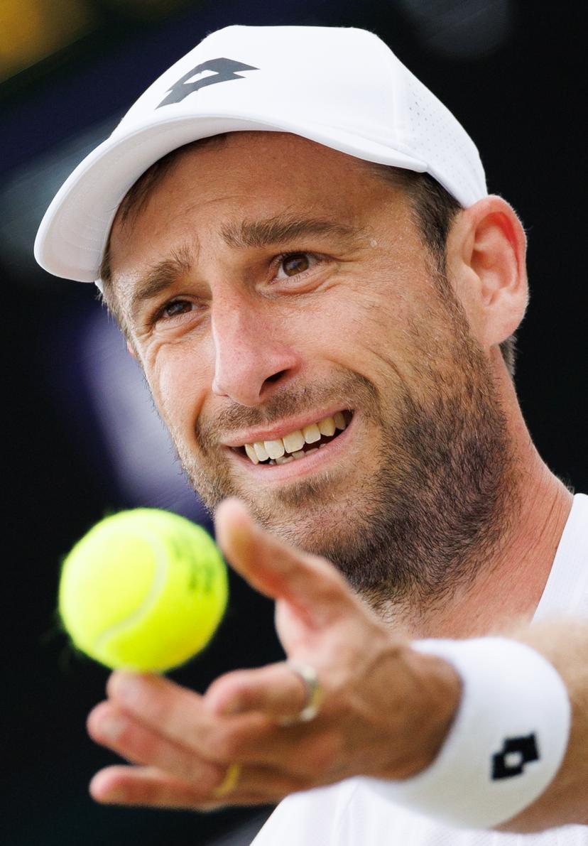 Belgian Sander Gille pictured in action during a doubles tennis match between Argentinian-Spain pair Zeballos - Granollers and Belgian-Dutch pair Gille-Verbeek, in the second round of the Men's doubles at the Wimbledon grand slam tennis tournament in London, Britain, Saturday 04 July 2026. BELGA PHOTO BENOIT DOPPAGNE