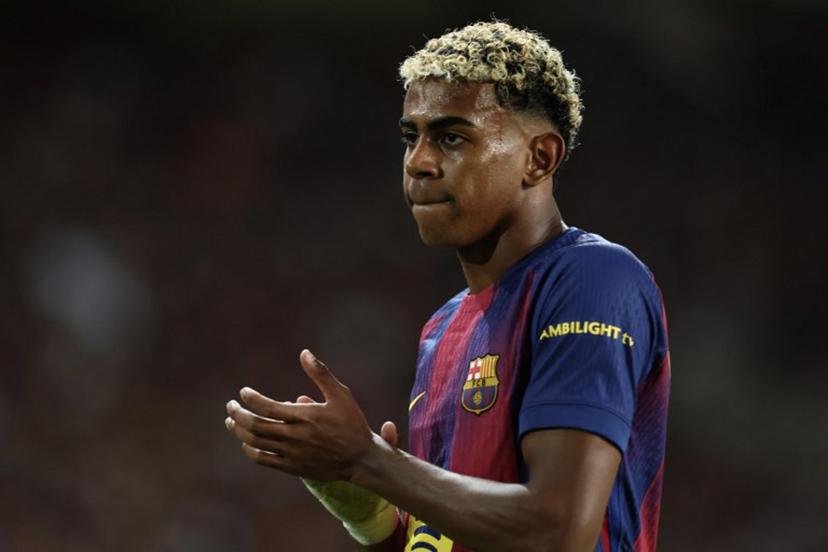 Barcelona's Spanish forward #10 Lamine Yamal reacts during the UEFA Champions League league phase day 2 football match between FC Barcelona and Paris Saint-Germain (PSG) at the Estadi Olimpic Lluis Companys in Barcelona, on October 1, 2025.  Josep LAGO / AFP