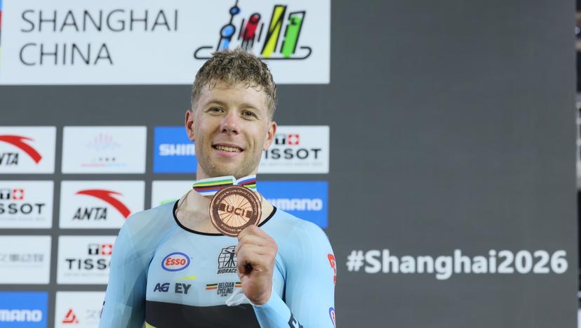 Belgian Jules Hesters celebrates on the podium with the bronze medal of the Men's Elimination Race event, at the UCI Track Cycling World Championships in Shanghai, China on Sunday 18 October 2026. The worlds are taking place from 14 to 18 October 2026. BELGA PHOTO BENOIT DOPPAGNE