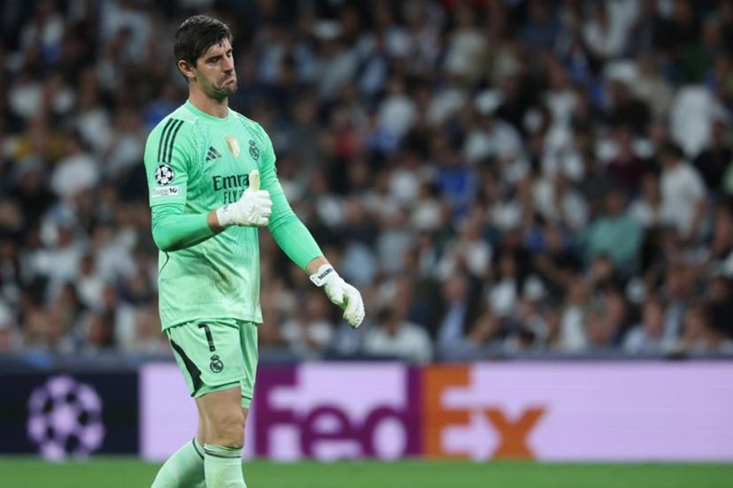 Real Madrid's Belgian goalkeeper #01 Thibaut Courtois gives a thumbs-up during the UEFA Champions League league phase day 3 football match between Real Madrid CF and Juventus at Santiago Bernabeu Stadium in Madrid on October 22, 2025.  Pierre-Philippe MARCOU / AFP