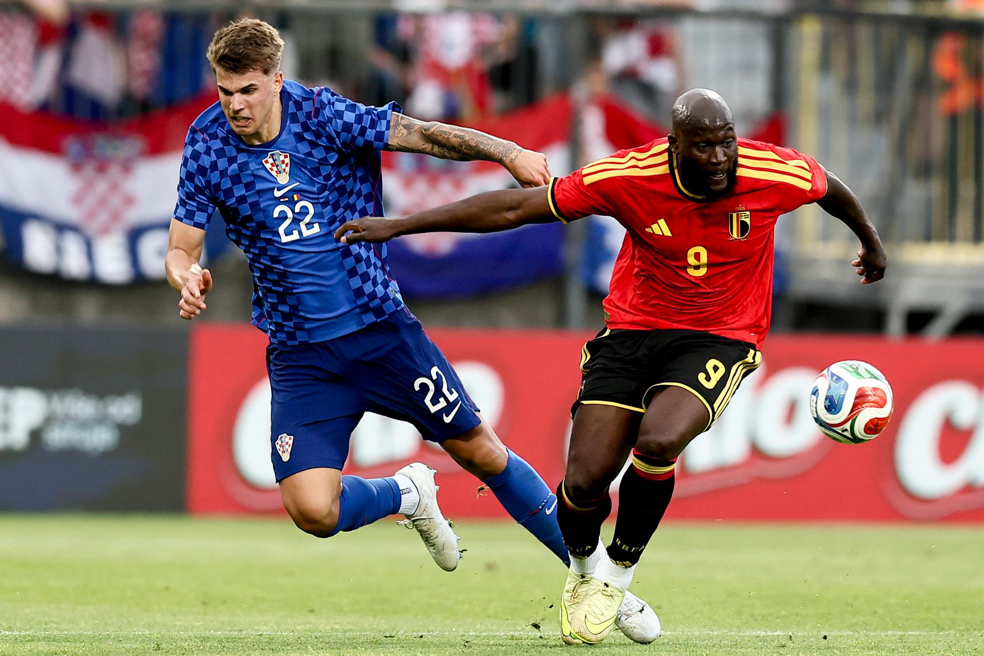 Croatia's Luka Vuskovic and Belgium's Romelu Lukaku pictured during a friendly soccer game between Croatia and Belgian national soccer team Red Devils, in Rijeka, Croatia, on Tuesday 02 June 2026, part of the preparations for the 2026 FIFA World Cup. BELGA PHOTO BRUNO FAHY