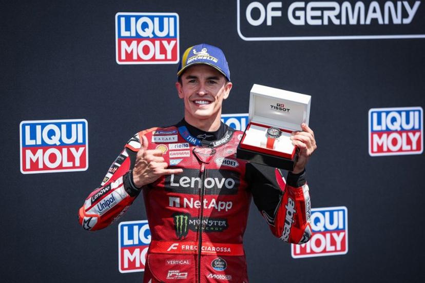 Ducati Lenovo Team's Spanish MotoGP rider Marc Marquez reacts after winning the qualifiying session of the German Motorcycle MotoGP Grand Prix at the Sachsenring race track in Hohenstein-Ernstthal near Chemnitz, eastern Germany, on July 11, 2026.  Ronny HARTMANN / AFP