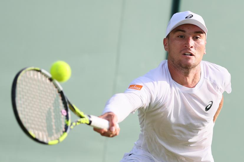 Belgian Raphael Collignon pictured in action at a tennis game against Croatian Cilic, in the first round of the men's singles at the 2025 Wimbledon grand slam tournament, Tuesday 01 July 2025 at the All England Tennis Club, in South-West London, Britain. BELGA PHOTO BENOIT DOPPAGNE