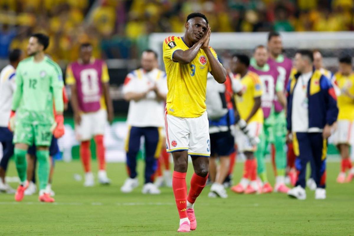 Colombia's defender #03 Jhon Lucumi celebrates after winning the 2026 World Cup Group K football match between Colombia and Democratic Republic of Congo at the Guadalajara Stadium in Zapopan on June 23, 2026.   Ulises RUIZ / AFP