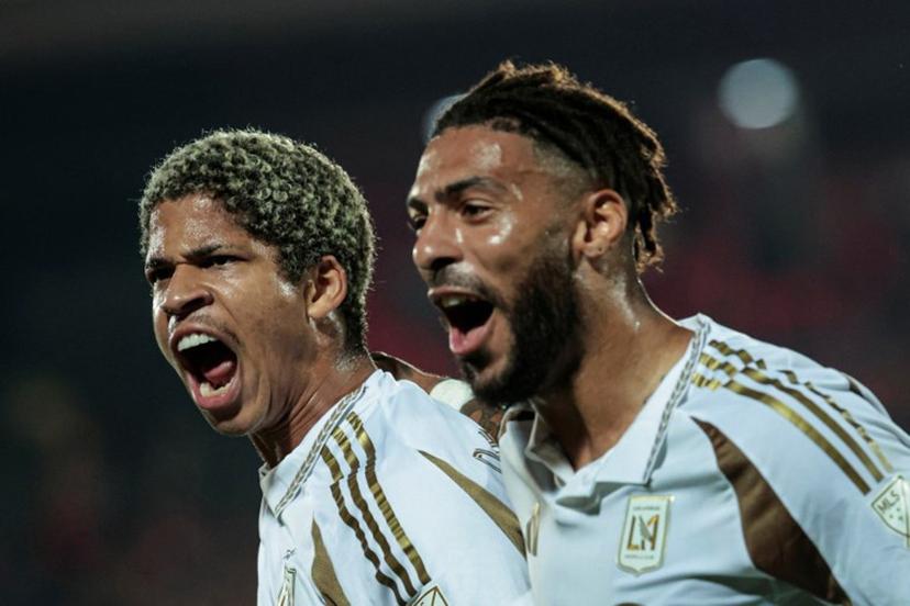 Los Angeles FC's Venezuelan forward #30 David Martinez (L) celebrates with teammate Gabonese forward #99 Denis Bouanga after scoring his team's second goal during the CONCACAF Central American Cup round of 16 second leg football match between Costa Rica's Alajuelense and US' Los Angeles FC at the Alejandro Morera Soto Stadium in Alajuela, Costa Rica on March 17, 2026.  JOHN DURAN / AFP