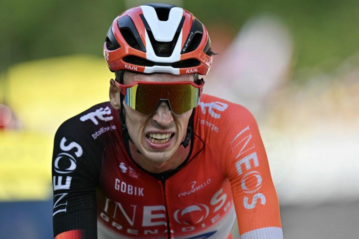 INEOS Grenadiers team's Dutch rider Thymen Arensman cycles to the finish line to place second during the 10th stage of the 112th edition of the Tour de France cycling race, 165.3 km between Ennezat and Le Mont-Dore Puy de Sancy, in central France, on July 14, 2025.  Loic VENANCE / AFP
